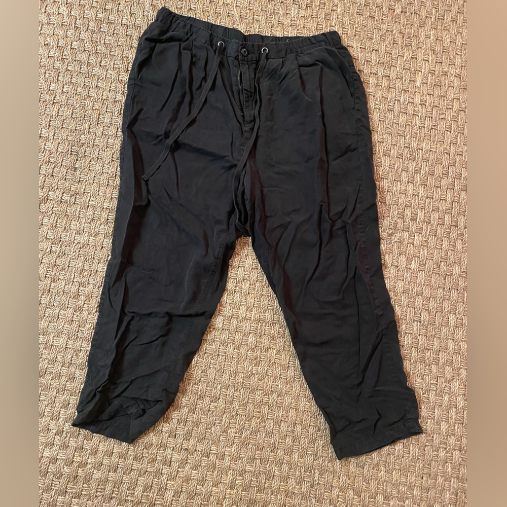 black flowy silky american eagle pants have button zipper and drawstring